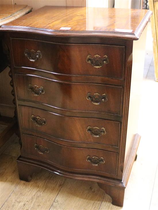 A George III style mahogany serpentine fronted chest of drawers, W.49cm